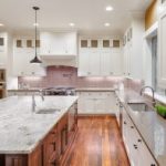 White cabinets have always been a classic trend, but kitchen islands are becoming the focal point of kitchen design trends!