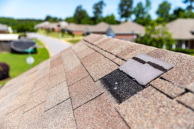 Damaged Roof Shingle After Storm